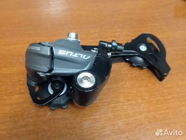Переключатель задний Shimano Altus на 7,8,9 скоро