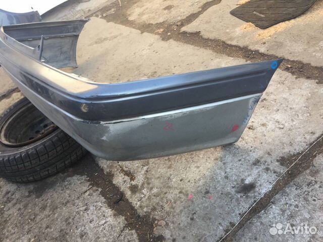 Бампер задний Toyota Carina 211