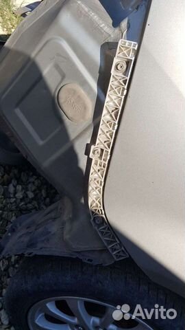 Кронштейн заднего бампера на Mitsubishi Lancer 10