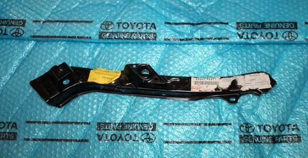 Суппорт фары Тойота Рав 4 -3 левый NEW 53203-42011