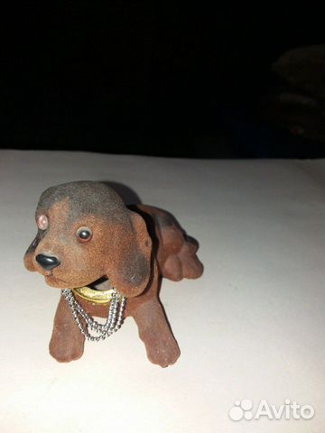 Собака с движущейся головой