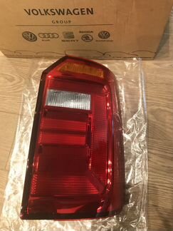 Новый, оригинальный, задний правый фонарь caddy