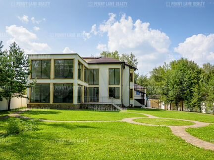 Коттедж 650 м² на участке 15 сот.