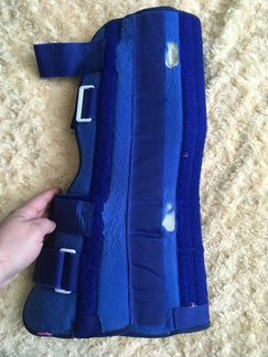 Коленный ортез жесткой фиксации