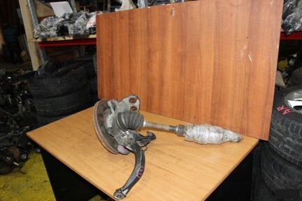 Поворотный кулак передний левый Mazda Atenza GGS3