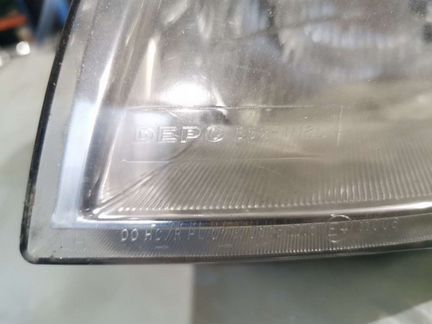 Фара левая Peugeout partner 2002