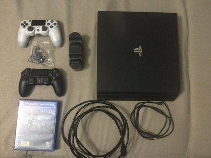 PS4 pro + 2 dualshock + зарядная станция + 2 игры